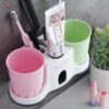 Toothpaste dispenser with cups