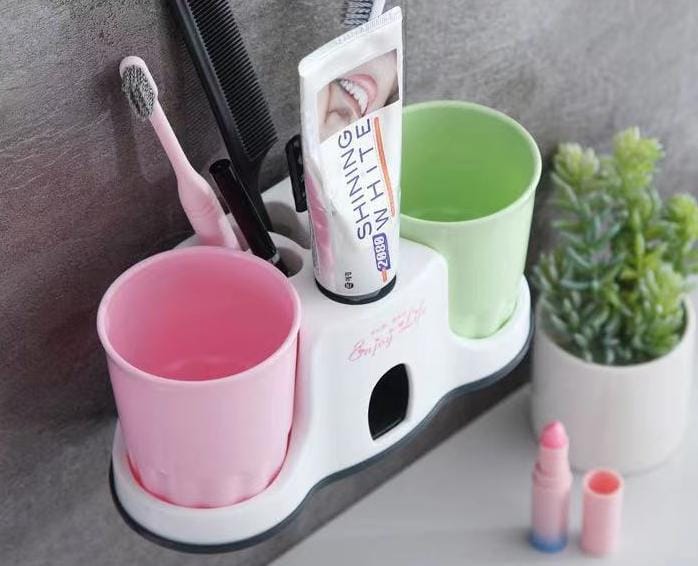 Toothpaste dispenser with cups