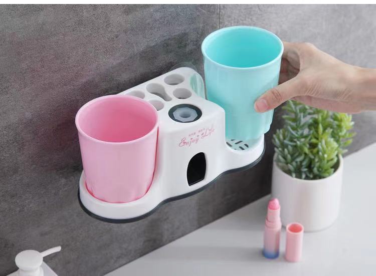 Toothpaste dispenser with cups