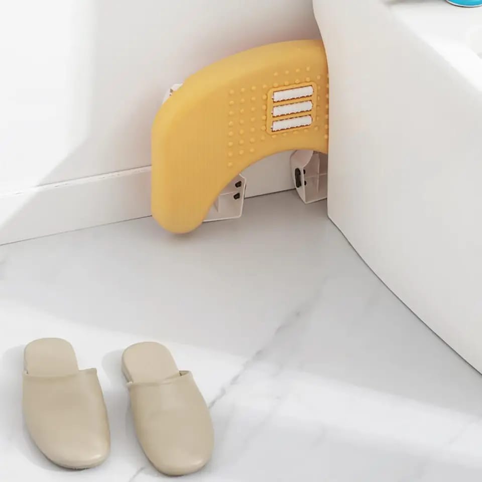 Foldable foot rest with rollers